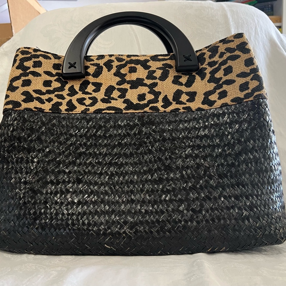 Black straw tote bag with leopard print burlap trim and wood handles